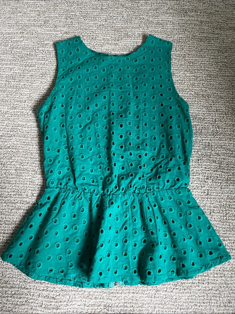 Green Eyelet Peplum Sleeveless Top with back zipper. Size XS